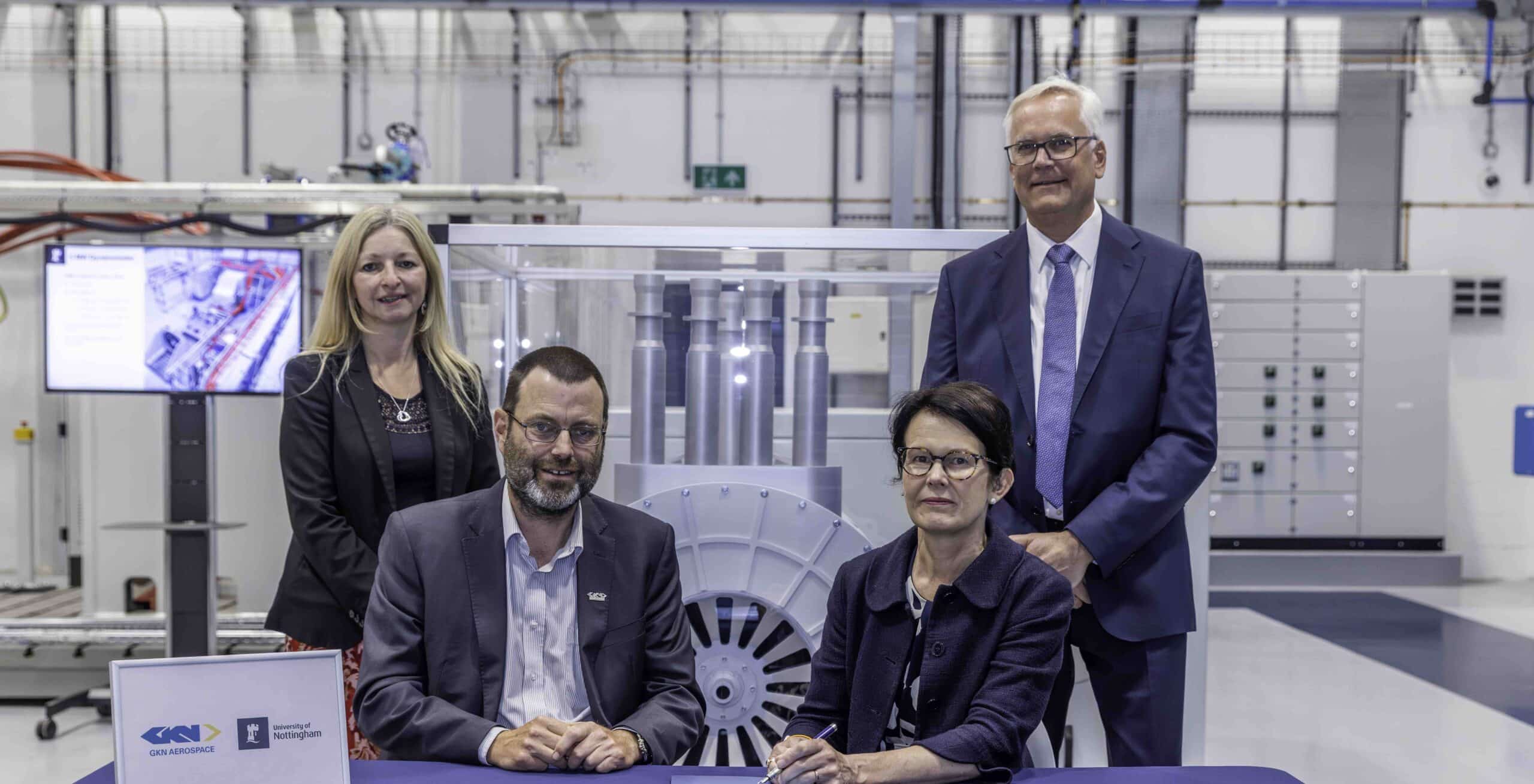 Group photo of people in the university's newly established, UKRPIF co-funded Hybrid Propulsion Systems facility.