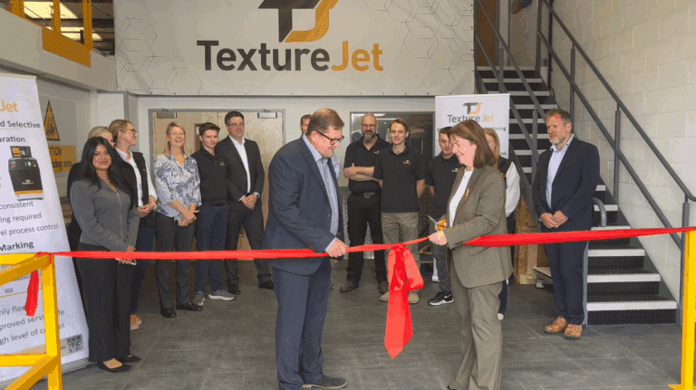 Jonathon Mitchell-Smith and Mayor Claire Ward cutting the ribbon at TextureJet's new premises