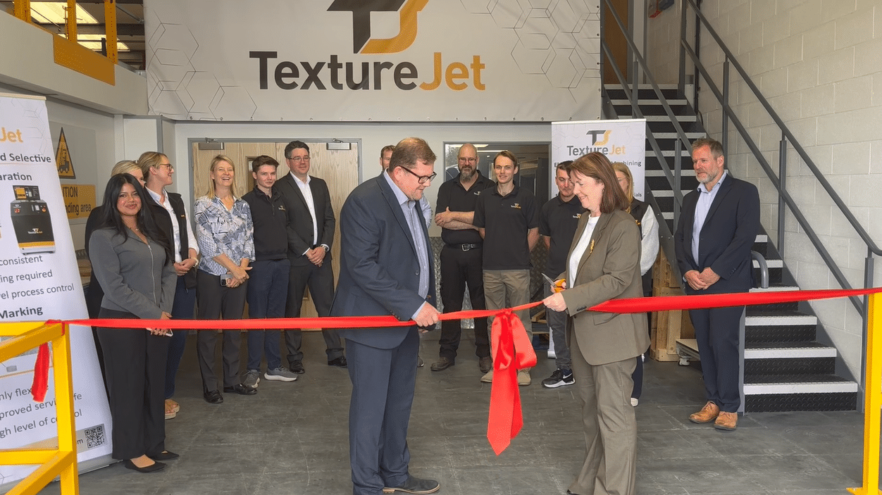 Jonathon Mitchell-Smith and Mayor Claire Ward cutting the ribbon at TextureJet's new premises